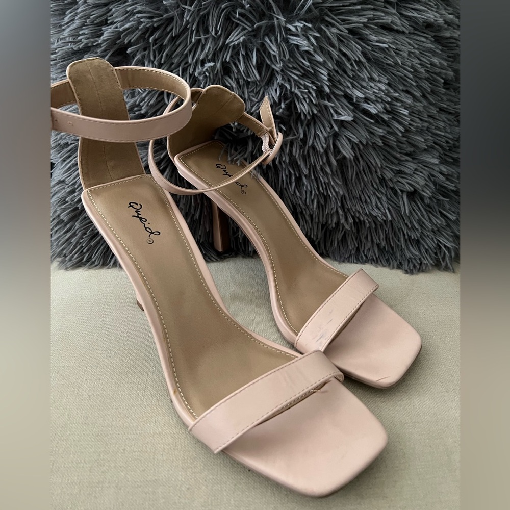 Pinkish nude pink color cute heels in like new condition.